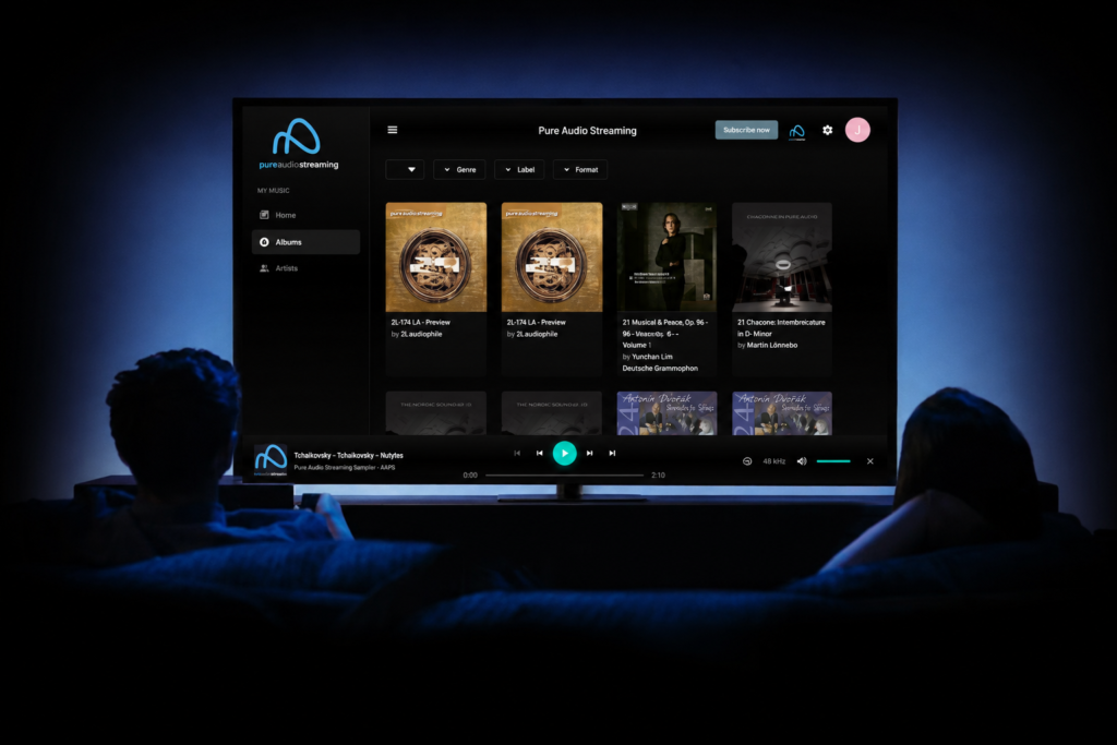 Pure Audio Streaming Apple TV app displayed on a television screen, providing access to lossless high-resolution and immersive audio streaming.